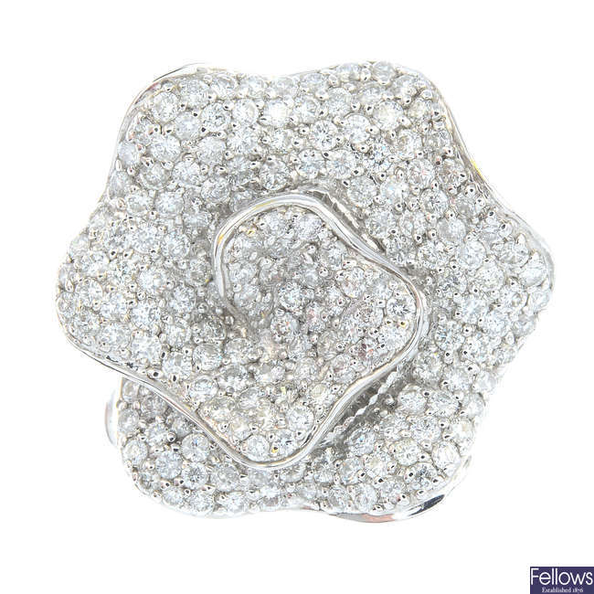 A diamond floral dress ring.