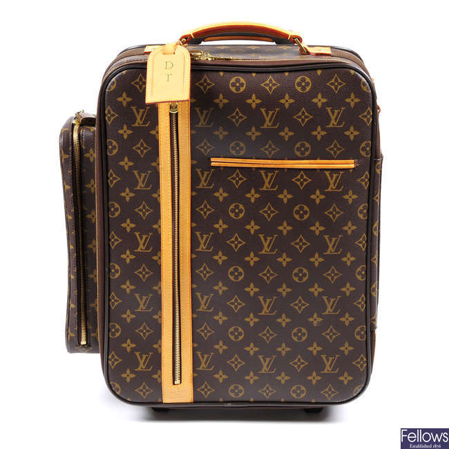 Sold at Auction: Louis Vuitton, Louis Vuitton Rolling Duffel Bag