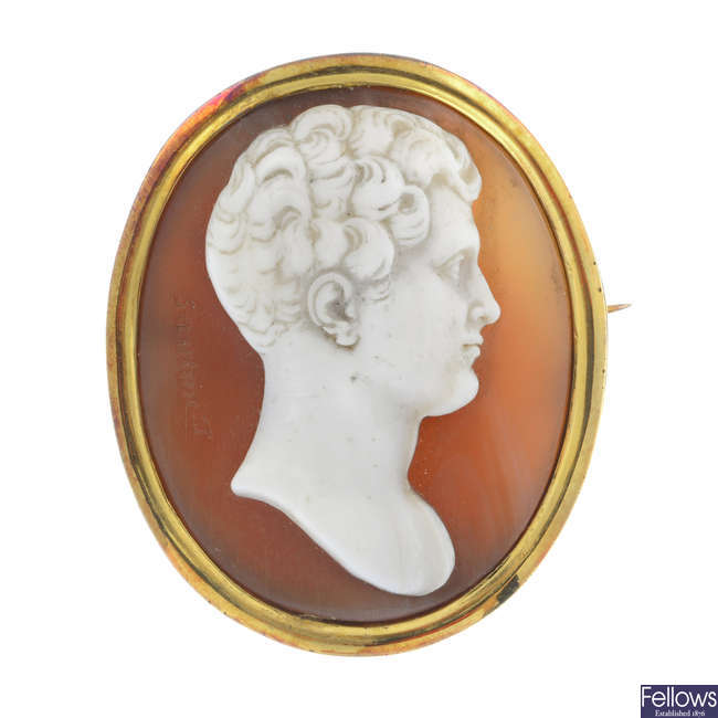 An early Victorian gold shell cameo brooch, signed Saulini T.