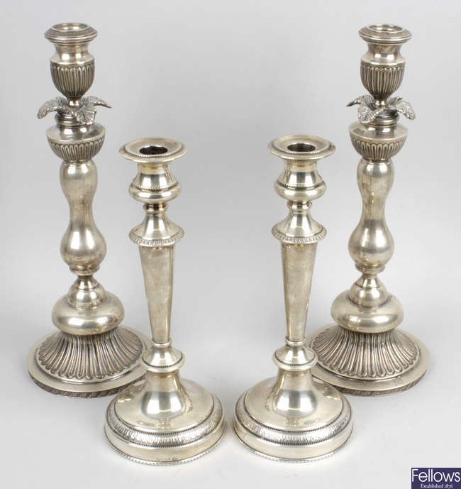 A pair of 20th century Greek 925 sterling silver candlesticks.