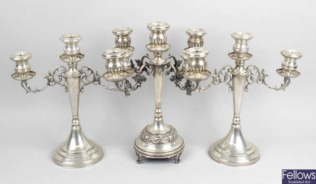 A pair of 20th century 925 sterling silver candelabra.