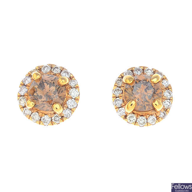 A pair of 'brown' diamond and diamond earrings.