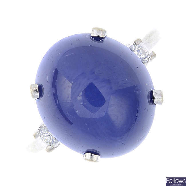 A synthetic star sapphire and diamond ring.