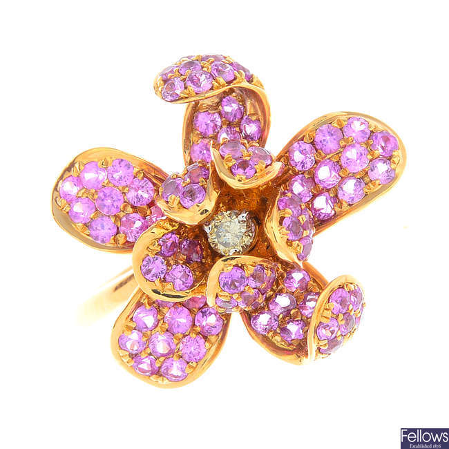 An 18ct gold pink sapphire and diamond flower ring.