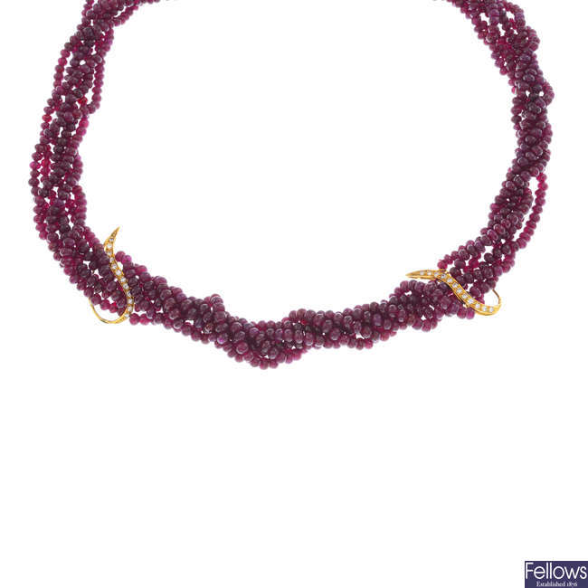 ASPREY & CO. - an 18ct gold diamond and ruby necklace.
