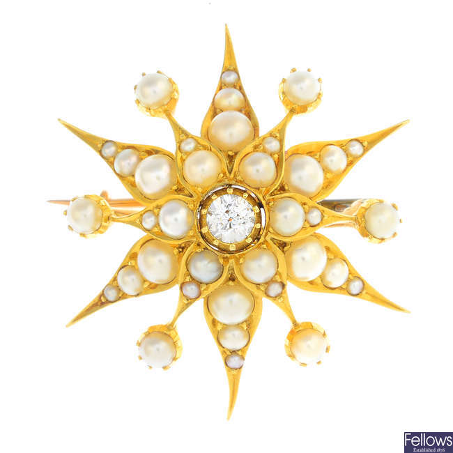 A late Victorian gold diamond and split pearl star brooch.