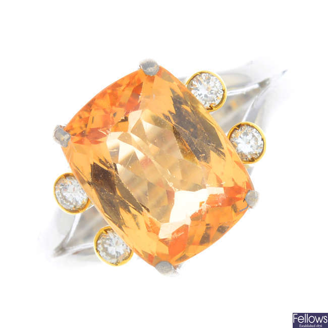 A topaz and diamond ring.