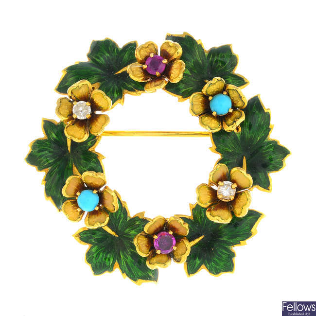 An early 20th century 18ct gold enamel, diamond, ruby and turquoise floral brooch.