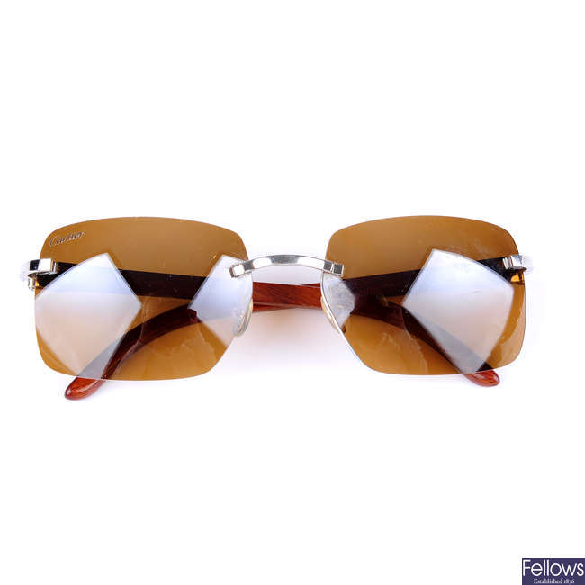 CARTIER - a pair of C Decor rimless sunglasses.