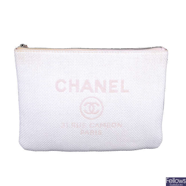 CHANEL - a pink Deauville cosmetic pouch.