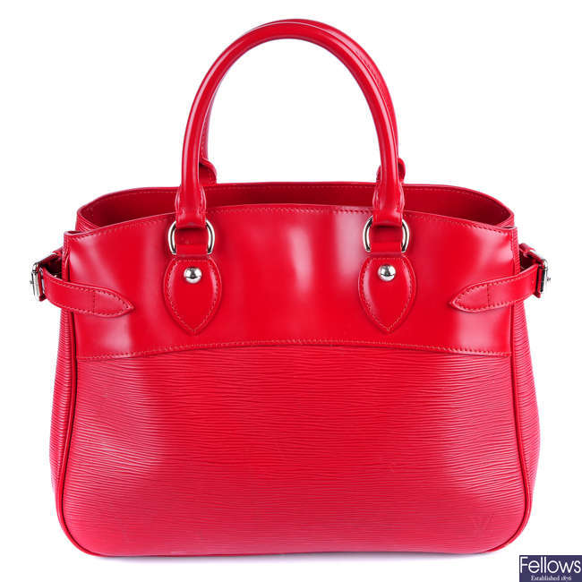 LOUIS VUITTON - a red Epi Passy handbag.