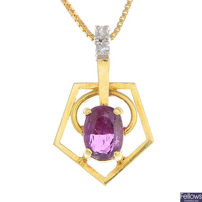 A ruby and diamond pendant, with chain.