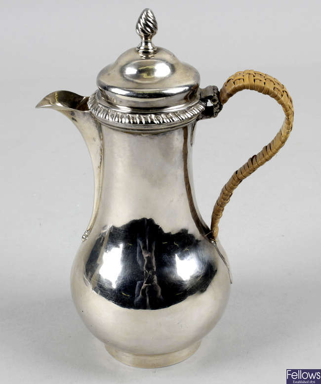An early George III silver chocolate or hot water pot.