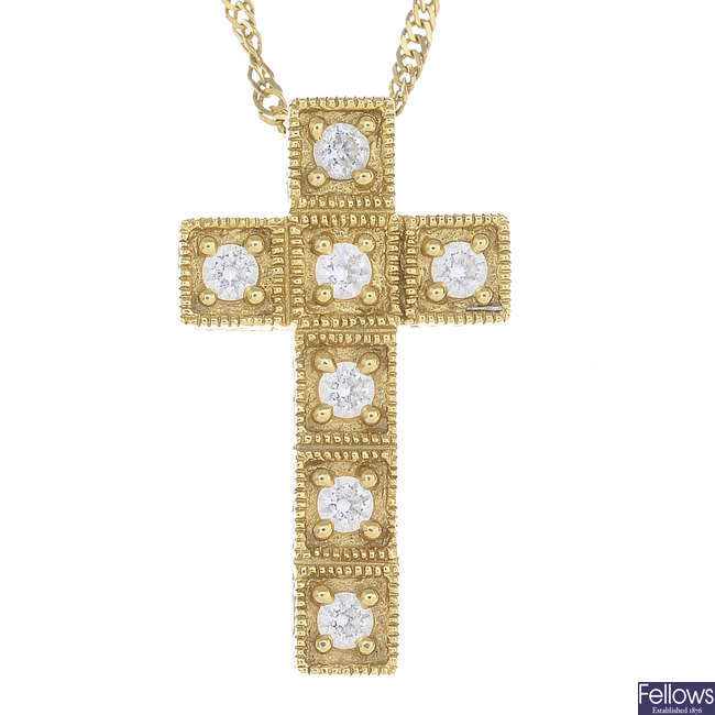 A 14ct gold cubic zirconia cross pendant, with chain.