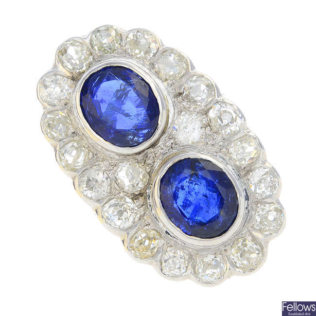 An 18ct gold Burmese sapphire and diamond double cluster ring.
