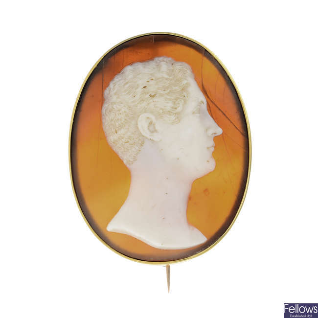 An early Victorian gold shell cameo brooch.
