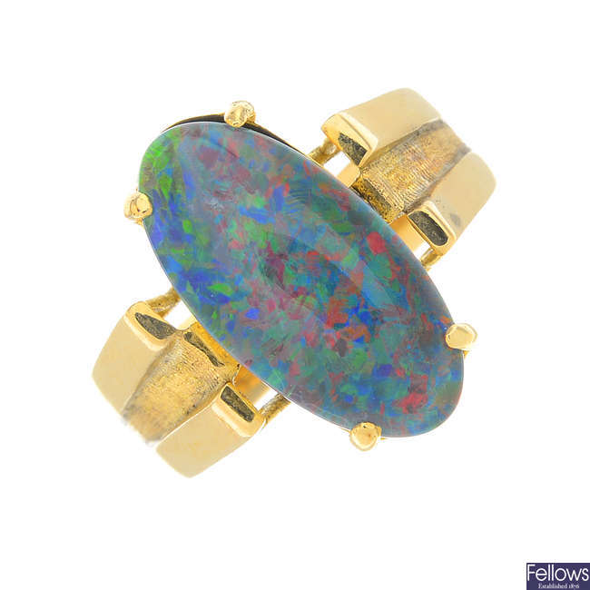 An opal triplet single-stone ring.