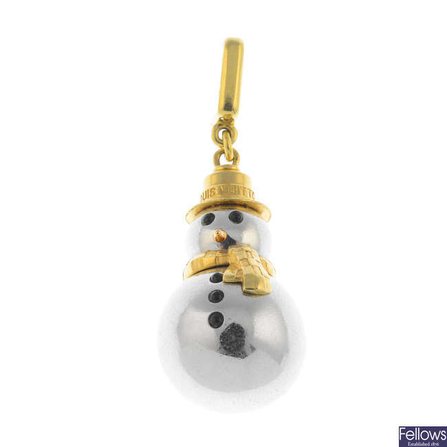 LOUIS VUITTON - an 18ct gold onyx snowman charm.