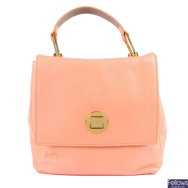COCCINELLE - a peach leather backpack.