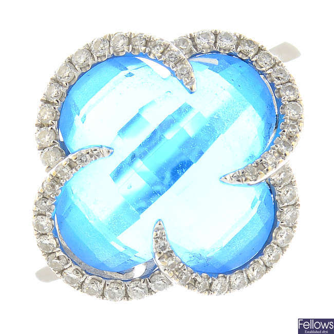 A topaz and diamond ring and earrings.