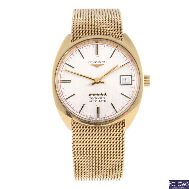 LONGINES - a gentleman's 9ct yellow gold Conquest bracelet watch.