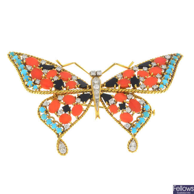 A mid 20th century 18ct gold and platinum, diamond, coral, turquoise and onyx butterfly brooch.