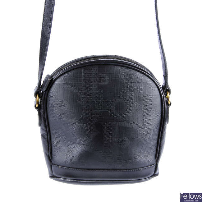 CHRISTIAN DIOR - a black saddle handbag.