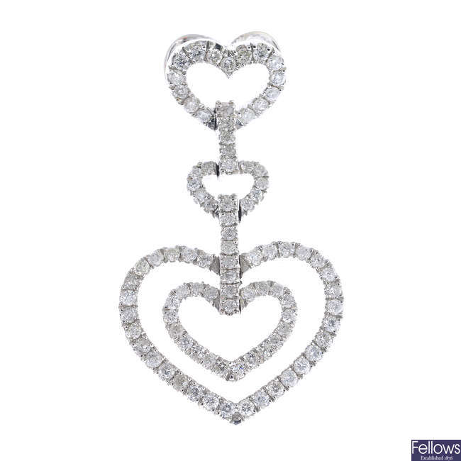 A diamond heart pendant.