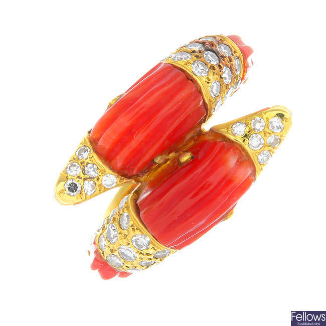 A mid 20th century 18ct gold coral and diamond crossover bird ring.
