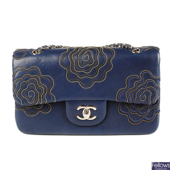 CHANEL - a beaded Camellia Flap handbag.