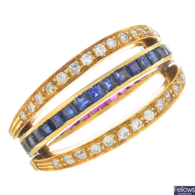 A mid 20th century diamond, sapphire and ruby full eternity flip ring.