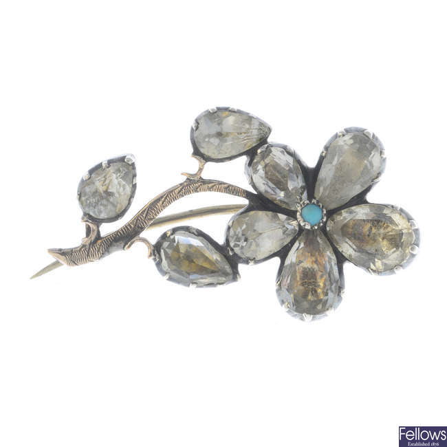 A late Georgian silver and gold foil-back rock crystal and turquoise floral brooch.