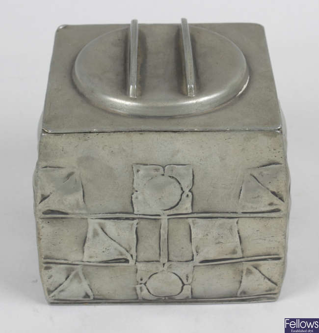 A Liberty & Co English pewter biscuit box and cover by Archibald Knox.