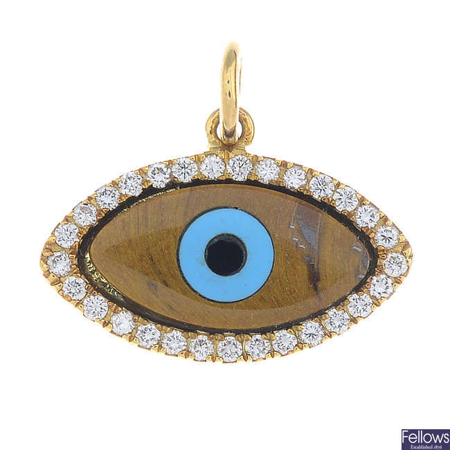 A diamond and gem-set 'evil eye' pendant.