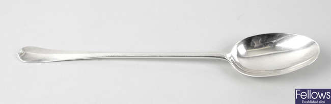 A Queen Anne Britannia silver basting spoon.