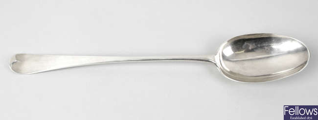 An early 19th century Newcastle silver basting spoon.