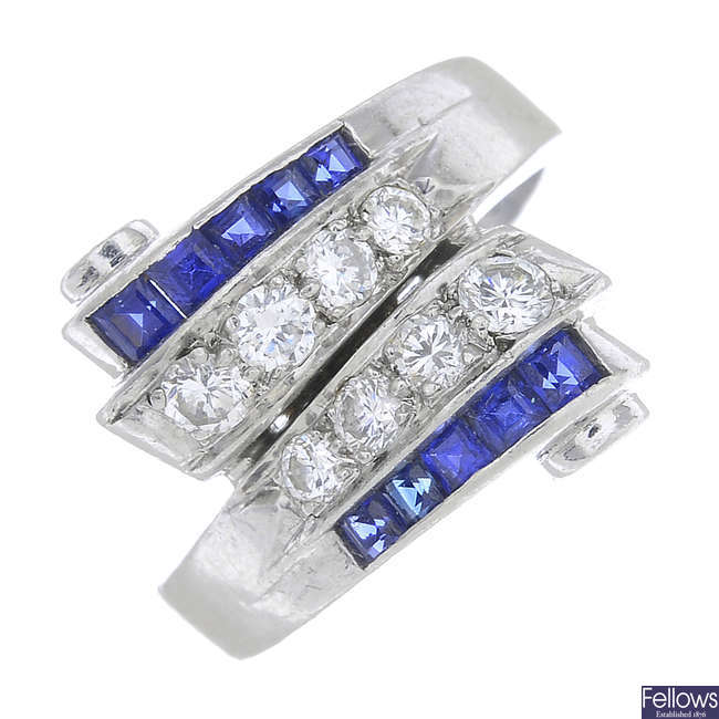 An Art Deco platinum, diamond and sapphire ring.