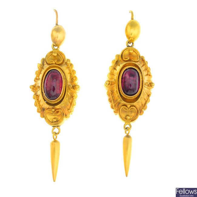 A pair of late Victorian gold garnet earrings.