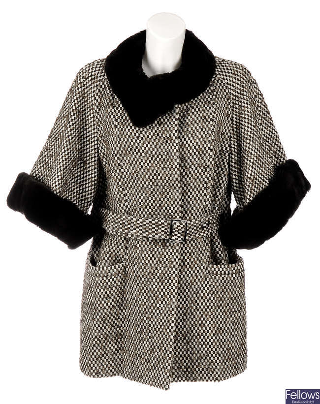 ARMANI COLLEZIONI - a three quarter-length virgin wool coat with fur trim.