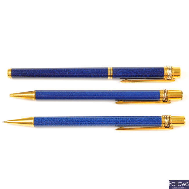 CARTIER - a set of two pens and a pencil.