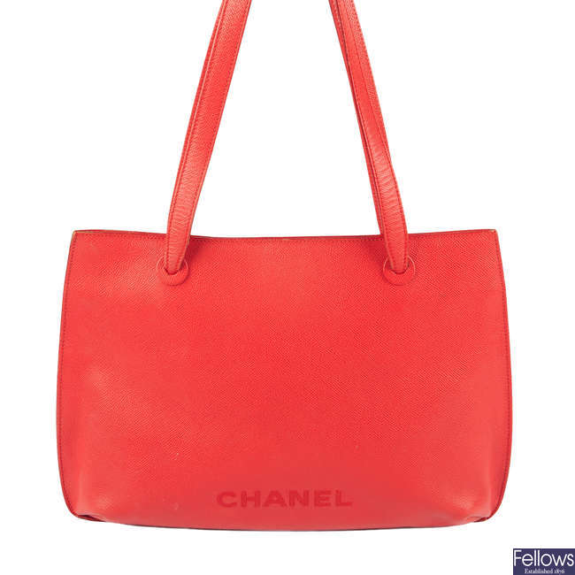 CHANEL - a vintage red leather handbag.