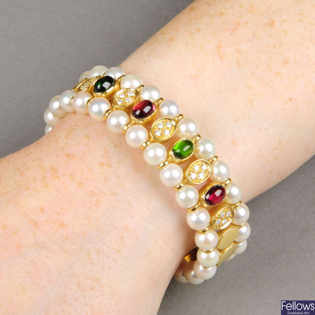 A cultured pearl, tourmaline and diamond bangle.