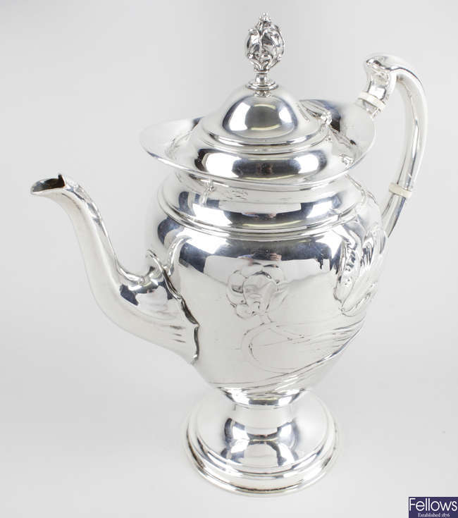 An Art Nouveau silver coffee pot. 