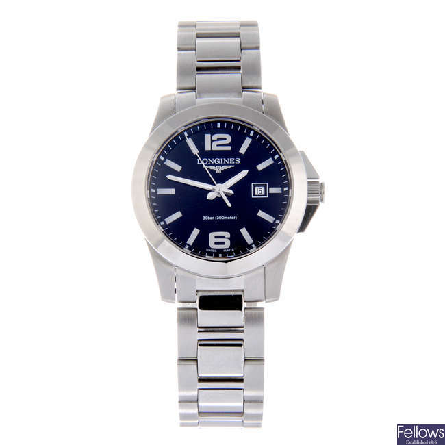 LONGINES - a lady's stainless steel Conquest bracelet watch.