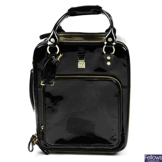ASPINAL OF LONDON - a black patent leather rolling travel case. 