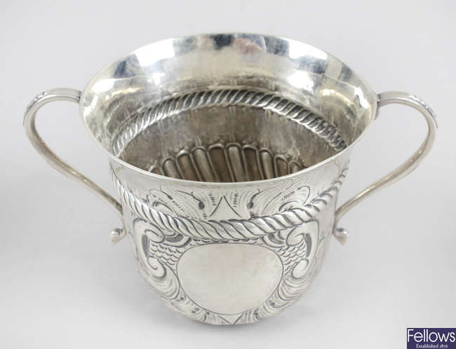 An Edwardian silver twin-handled cup.