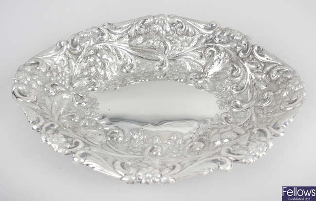An Edwardian embossed silver dish.