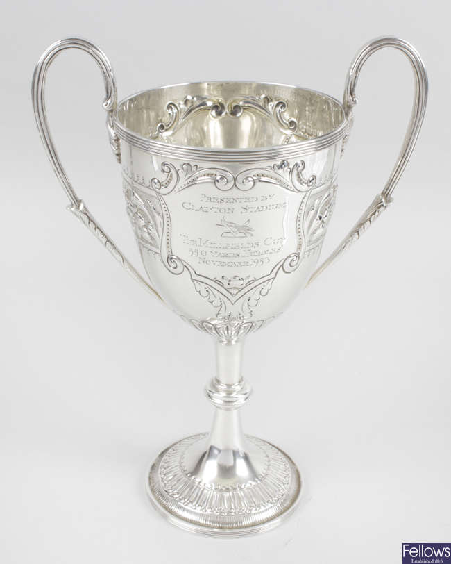 An Edwardian silver twin-handled trophy cup. 