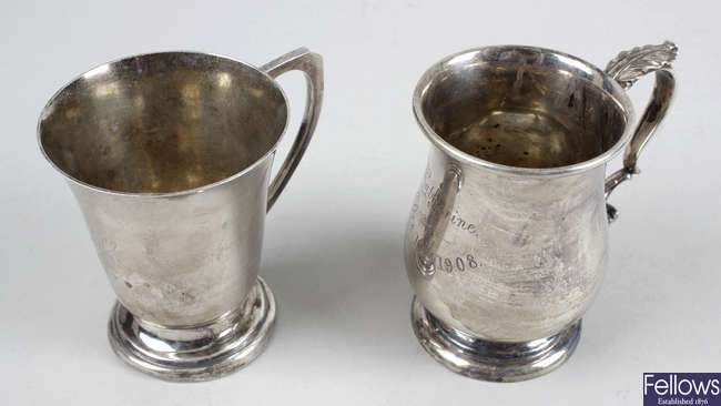 An Edwardian silver christening mug & a later example. (2).  