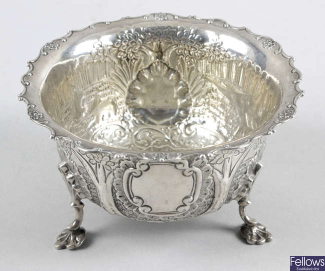 An Edwardian silver bowl, decorated with rabbits and pheasants.